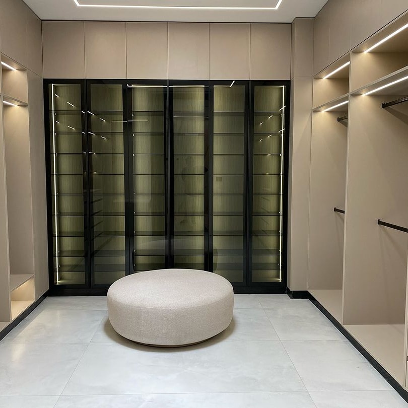 Bespoke walk-in closet with integrated storage and lighting
